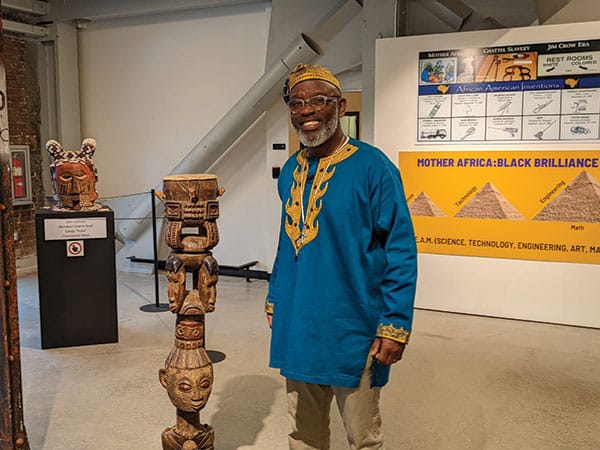 Delbert Richardson with artifacts from his museum